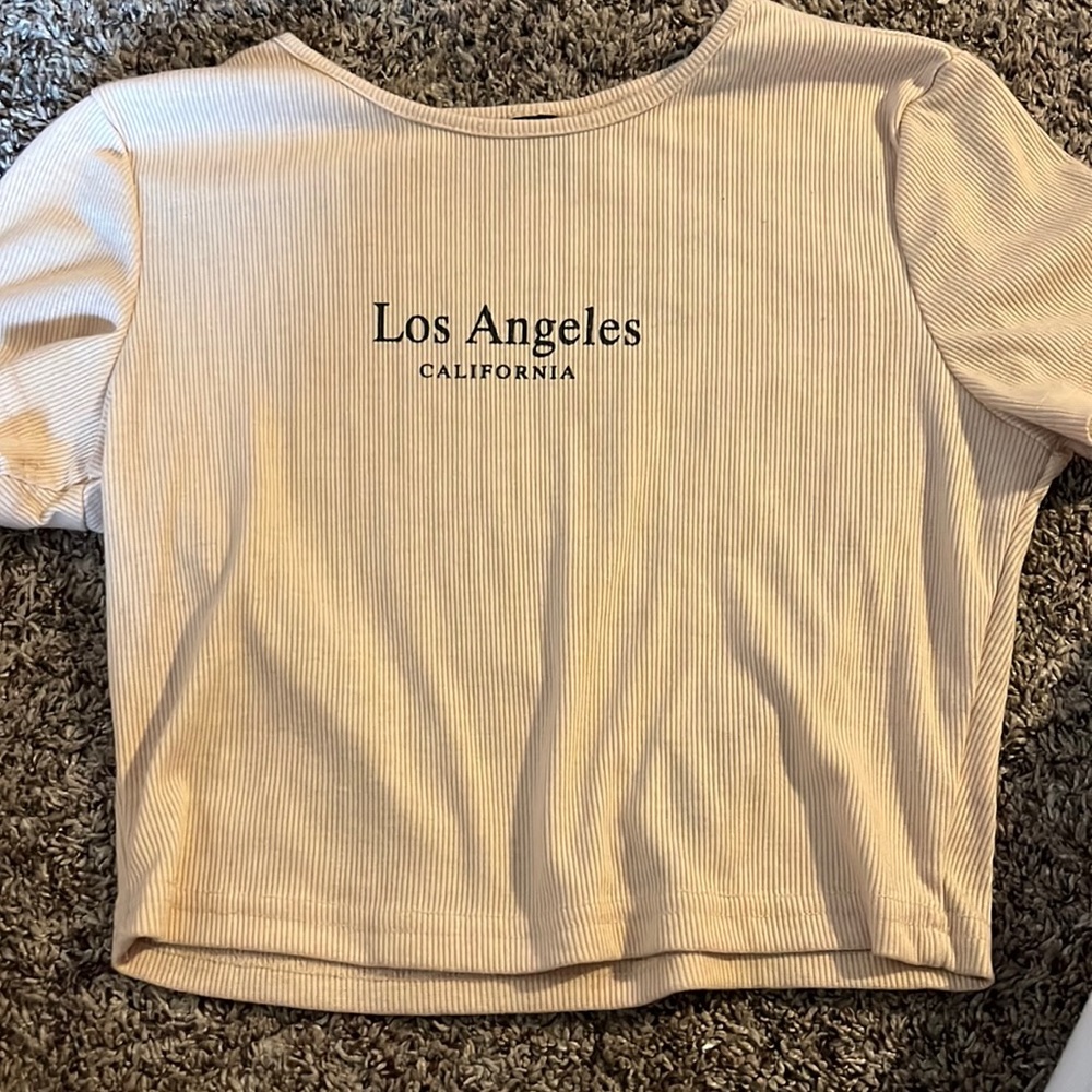 I barley wore this shirt but I love the color on it.